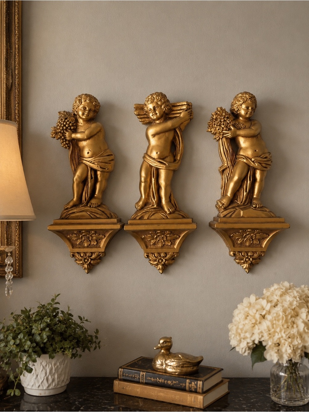 1969 Hollywood Regency-style Cherub wall hangings by Syroco